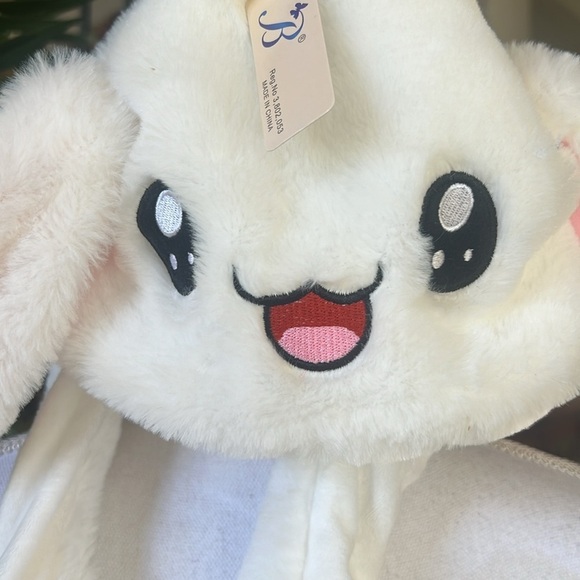 Bunny hat, new with tags super cute when you press the pause the ears go up - Picture 11 of 13